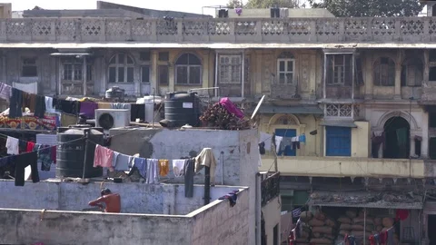 India rooftops shower third world Stock Footage 98676496