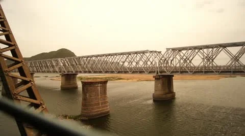India Train ride over Bridge Stock Footage 11621568