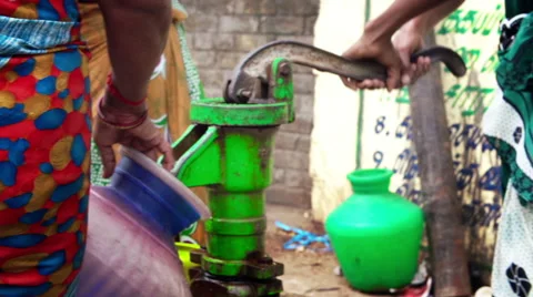 India water pumping from a well Stock Footage 63556575