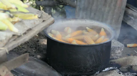 India Western Ghats corn cooking in steaming pot Stock Footage 24043258