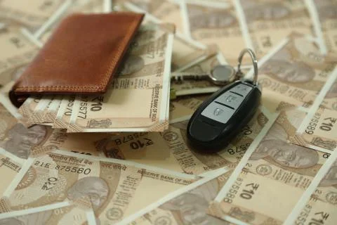 Indian 10 rupee currency notes in a wallet and on the table Stock Photos