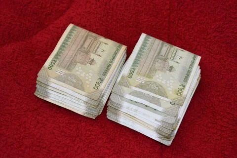 Indian 500 Rupees notes on red background Stock Photos