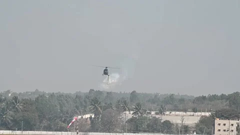 Indian Air Force HAL helicopter performing display at Aero India 23 airshow Stock-Footage 233075894