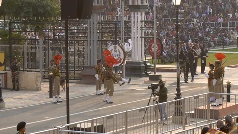 Indian and Pakistani Border Guards Kicking into Air at Wagah  Stock Footage 129346273