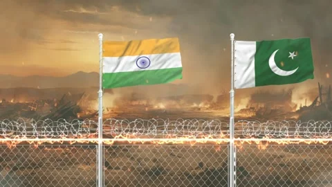 Indian and Pakistani flags fluttering side by side over a war torn battlefi.. Stockbeeldmateriaal 341618442