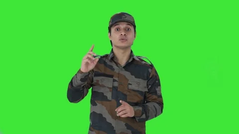 Indian army man talking to the camera Green screen Stock Footage 253161892