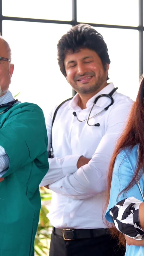 Indian Asian group of professional doctors surgeons collaborating and discussing Stock Footage 342574024