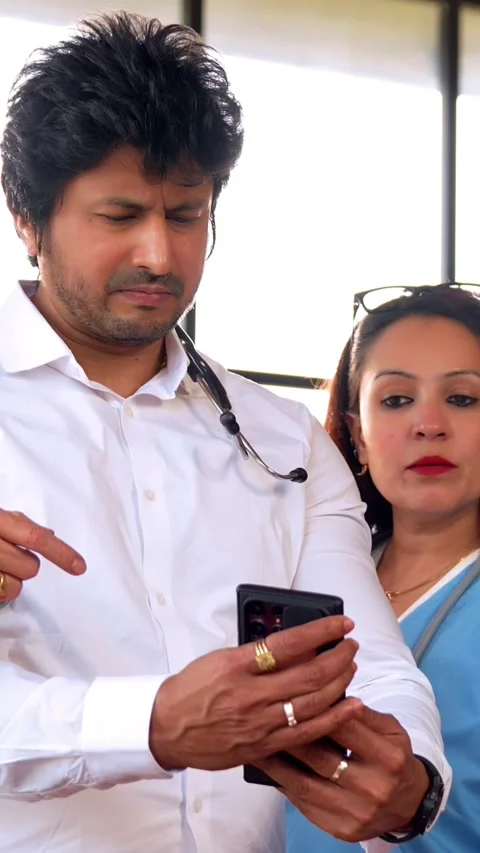 Indian Asian group of professional doctors surgeons collaborating and discussing Stock Footage 342574026