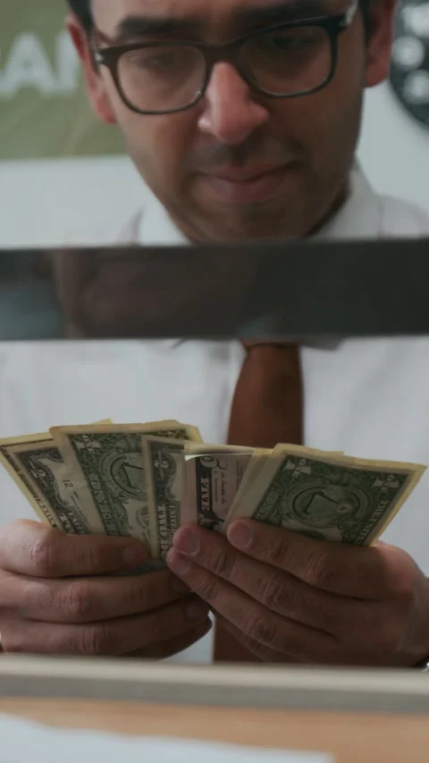 Indian Bank Teller Counting Stack of Cash Money 스톡 동영상 310116035