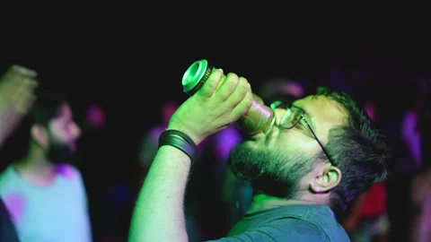 Indian boozer drinking beer can. Drunk man enjoy alcohol. Person hold beverage. Stock Footage 240077472