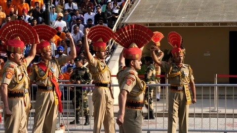 Indian border guards challenge the pakistani guards at the wagah border Stock Footage 115534909