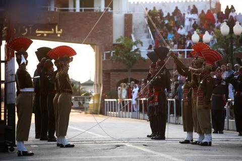 Indian border security force soldiers and Pakistani counterpart doing para... 스톡 사진