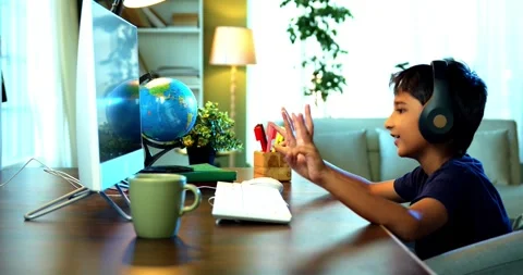 Indian Boy Attending Online Class at Home Using Laptop Stock Footage 343214592
