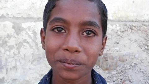 Indian boy looking at  the camera  Stock Footage 69863763