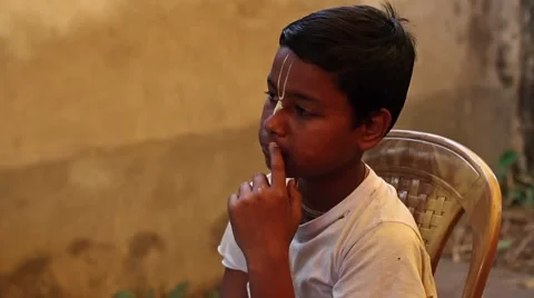 Indian boy looking thoughtful Stock Footage 49910269