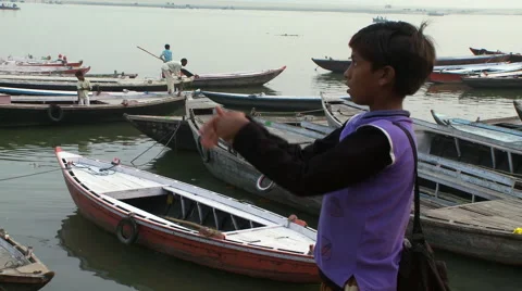 Indian boy pulling on his kite string. Stock Footage 59995320