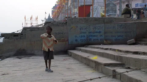 Indian boy pulling on a kite string. Stock Footage 59995299