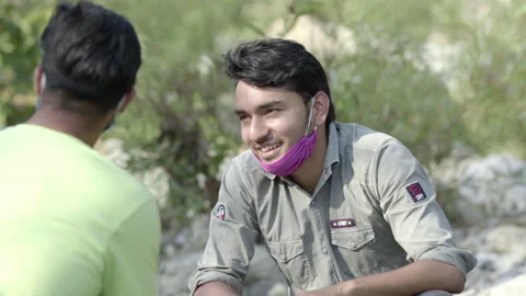 Indian boy talking with friends Stock Footage 134670401