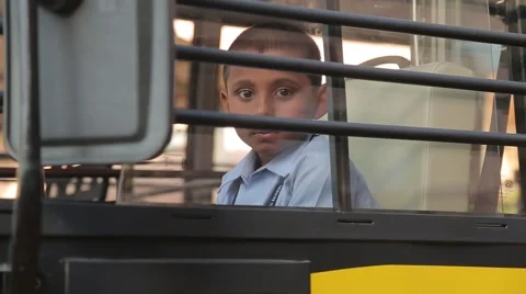 Indian boy waving from the school bus Stock Footage 49322540