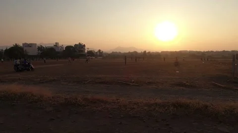 Indian Boys Playing Cricket In Evening, Sunset View Stock Footage