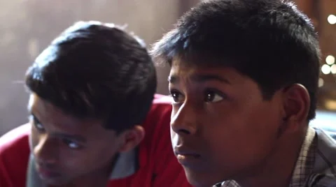 Indian boys practice drawing panning shot 2 Stock Footage 49908435