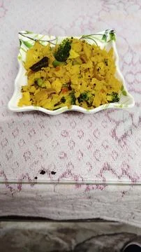 Indian breakfast Poha Stock Photos
