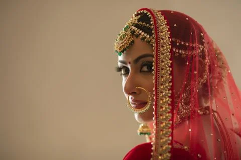 Indian bride looking back 	 Stock Photos