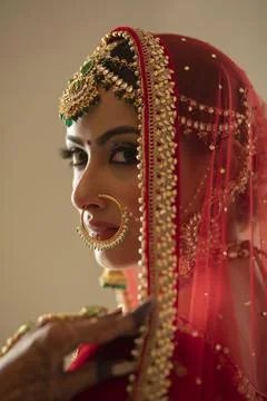 Indian bride looking back 	 Stock Photos