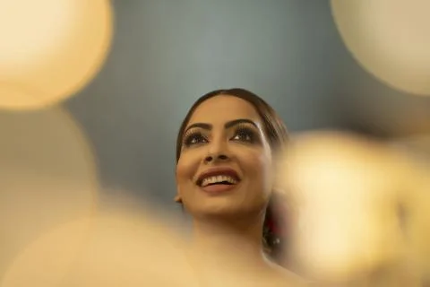 Indian bride in the make up room, getting ready	 Stock Photos