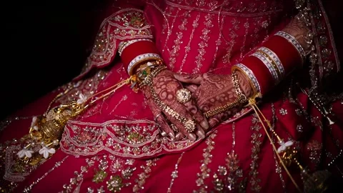 Indian Bride's Hands with Henna and Red Bangles Stock Footage 341874099