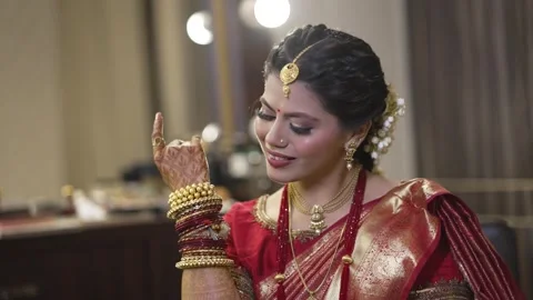 Indian Bride's Smiling Face and Bangles Stock Footage 265133672