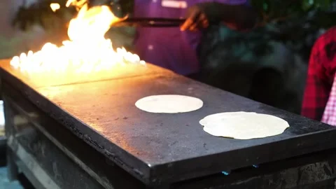 Indian brown Flat Bread - homemade Chapati or Roti, food preparation 스톡 동영상 199623624