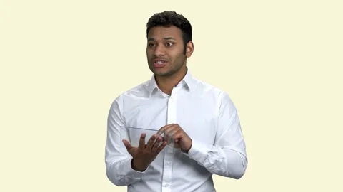 Indian business speaker using transparent computer tablet. Stock Footage 136031012