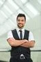 The indian businessman stand by business center Photo