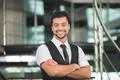 The indian businessman stand by business center stairs. Portrait view Photo