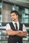 The indian businessman stand by business center stairs. Portrait view Photo