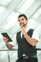 The indian businessman stand by business center work with the tablet Photo