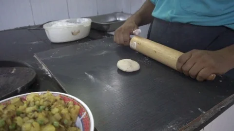 Indian chef rolling dough Stock Footage 70474303