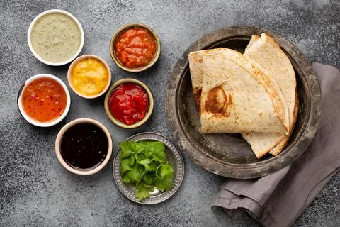 Indian chutneys and flatbread Stock Photos