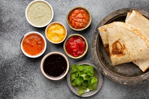 Indian chutneys and flatbread Stock Photos