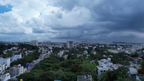 Indian City, Aerial clip of Bangalore Skyline at Dusk in the Monsoon Stock Footage