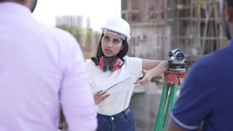 Indian civil engineer or architect giving some advice,instruction to worker. Stock Footage 161809129