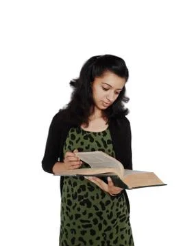 Indian college student reading over white. Stock Photos