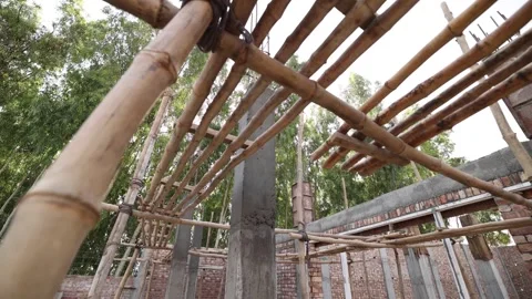 Indian Construction Site Passing Under Bamboo Scaffolding 스톡 동영상 267437918