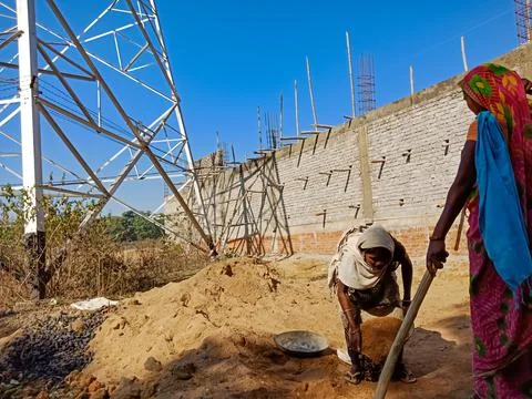 Indian construction site workers. Stock Photos