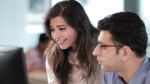 Indian coworkers working on creative task in a modern office,India  Stock Footage 88339478