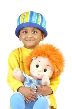 Indian Cute Boy with Doll in Studio Stock Photos