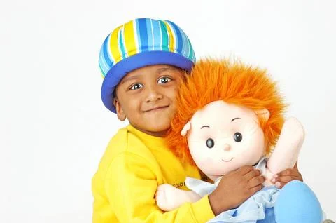 Indian Cute Boy with Doll in Studio Stock Photos
