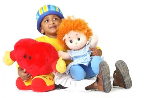 Indian Cute Boy with Doll in Studio Stock Photos