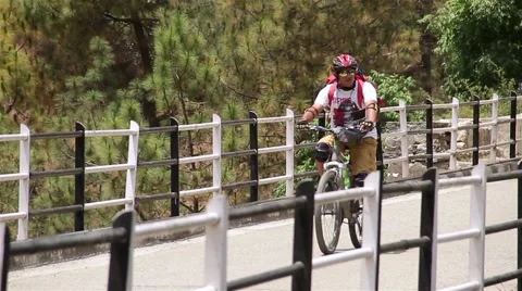 Indian cyclist on the bridge Stockbeeldmateriaal 45309272